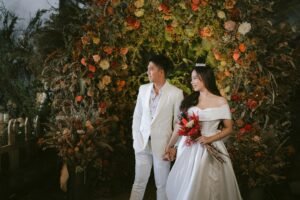 Happy couple in wedding attire, representing successful ketosis tips