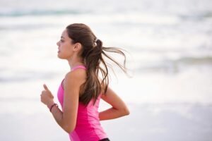 Bride following a wedding weight loss plan by exercising